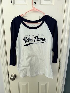 League White Tee with Navy Trim and Script Logo